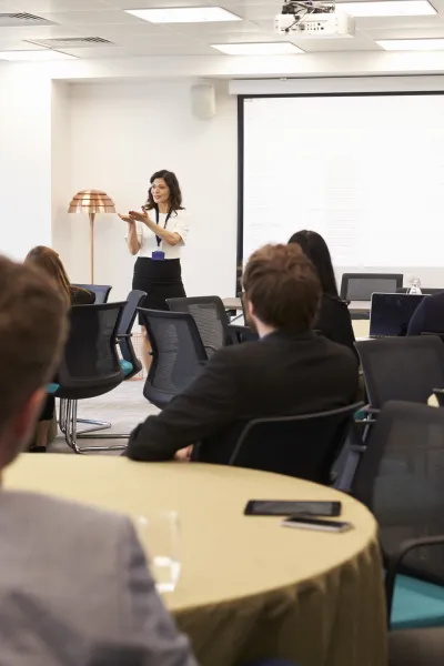 businesswoman-making-presentation-at-conference-2026-01-05-22-39-46-utc.jpg