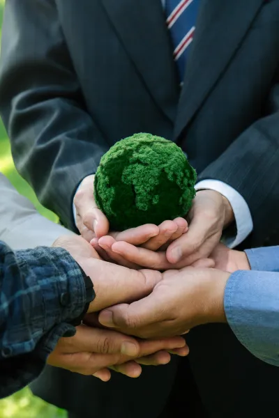 group-of-business-holding-green-globe-for-csr-cor-2026-01-06-09-46-10-utc.jpg